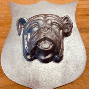Heavy metal doggie crest relief sculpture!